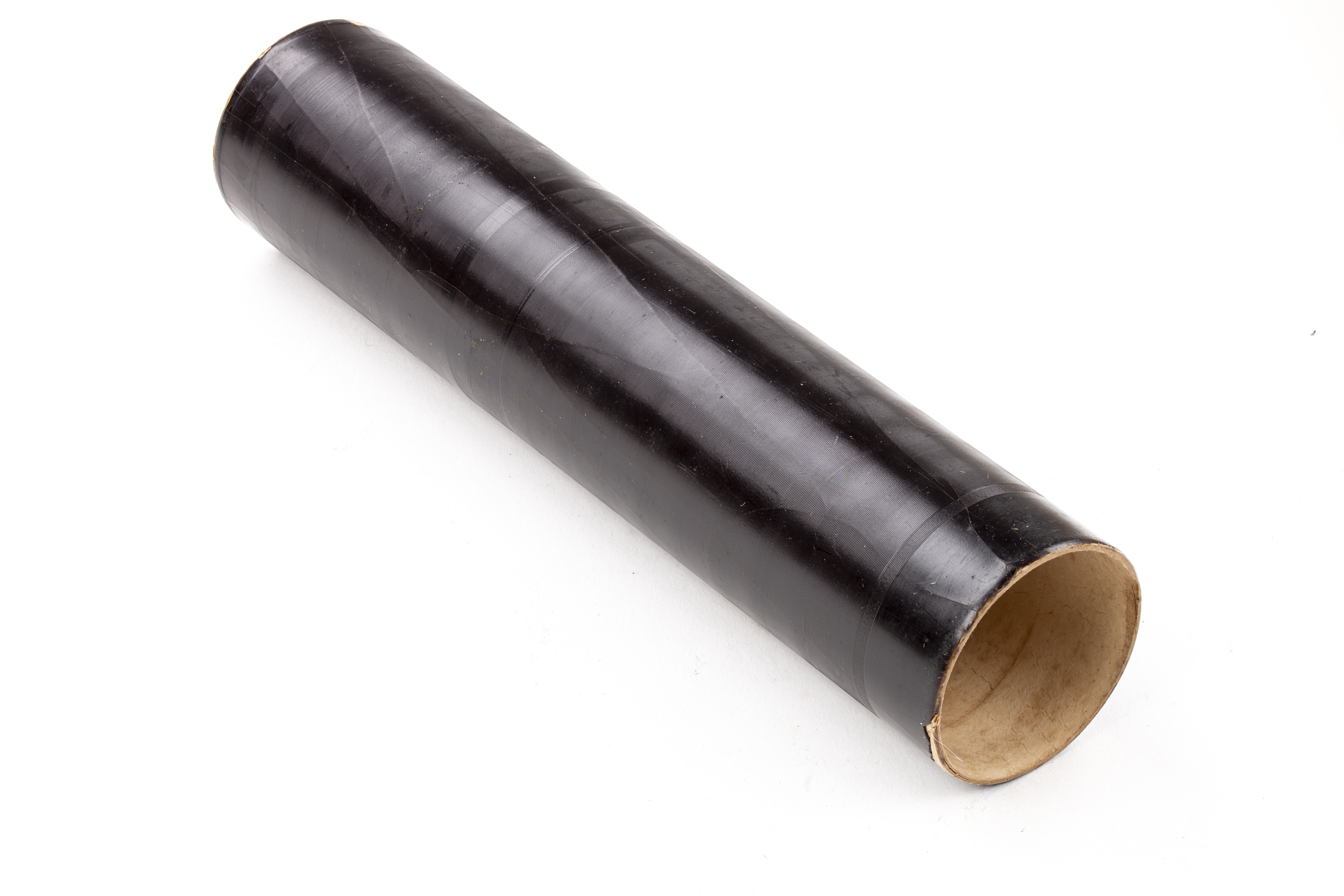 Bell-Tainter cylinder three-quarter view showing wax coating on cardboard
