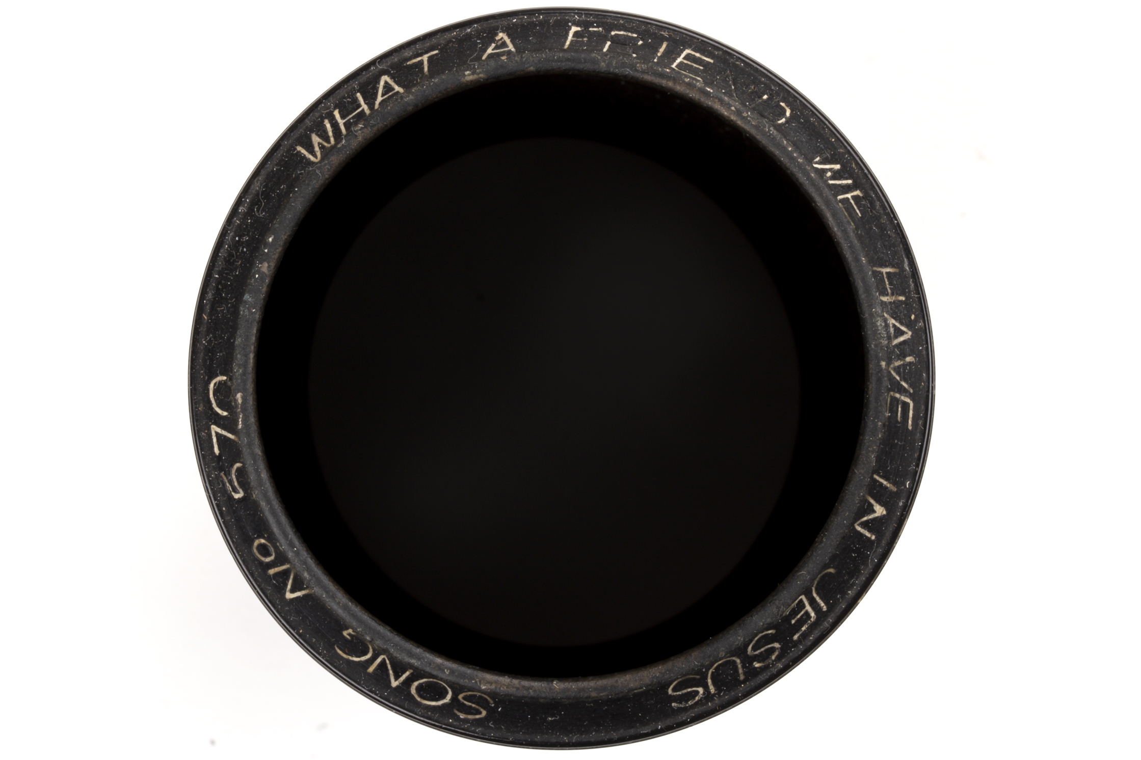 Top view of black cylinder record showing title and song number (570)