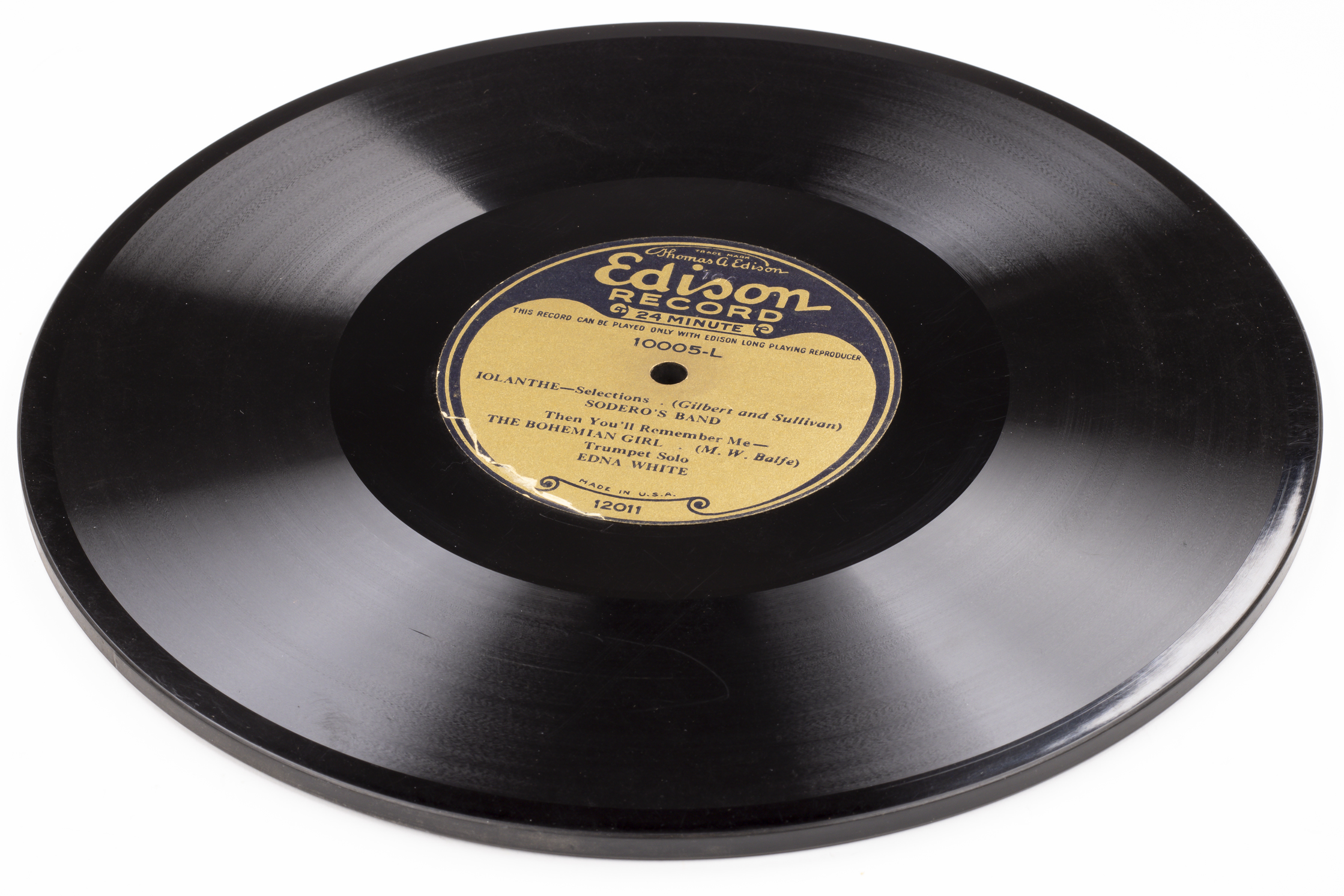 Three-quarter view showing thickness of the record.