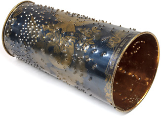 Sheet metal cone with punched tabs for Capital Cuff music box