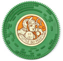 Plastic disc with molded pins, gear teeth around its edge and a paper lable for Tuneyville musical toys